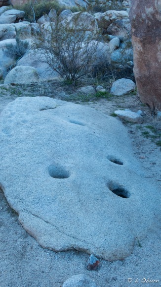 Morteros etched into granite boulders dot the landscape.